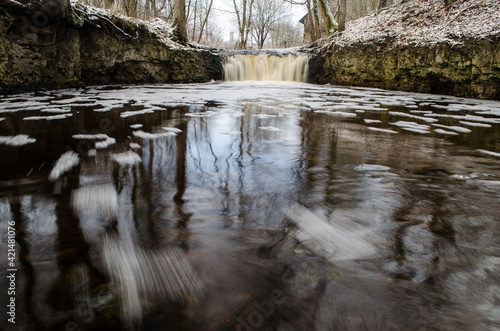 Long exposure waterfall on small river Ivande in Renda, Latvia