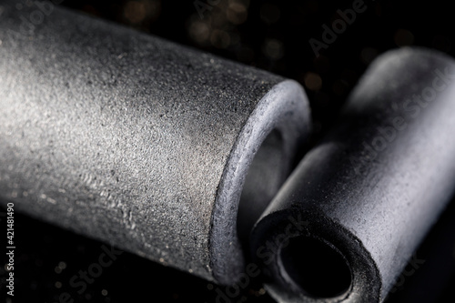 Close up of a ferrite bead inductor. An electrical element that suppresses high-frequency electronic noise in electronic circuits.