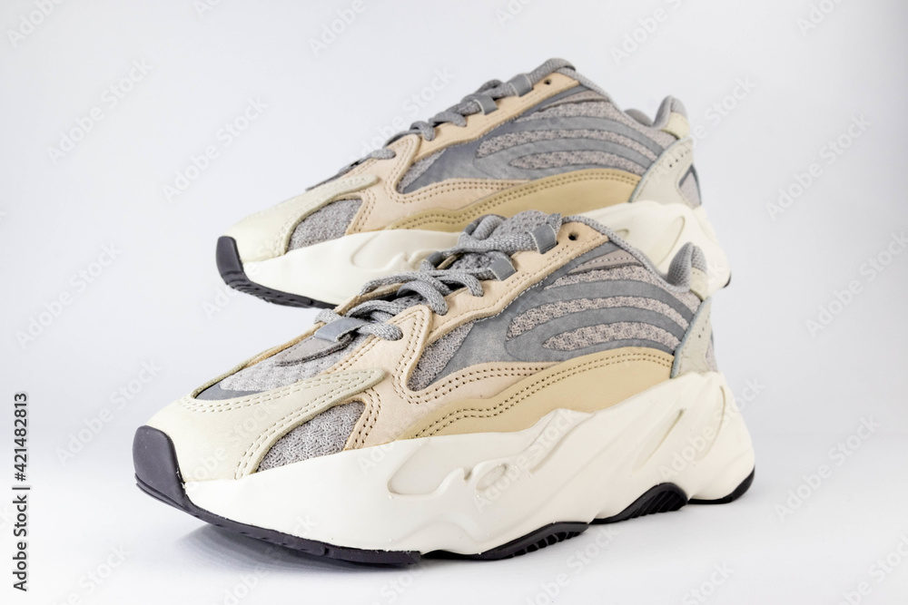 WARSAW, POLAND - Mar 16, 2021: Adidas Yeezy boost 700 V2 Cream. limited  collection sneakers with box. white background. Stock Photo | Adobe Stock