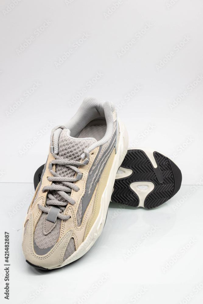 WARSAW, POLAND - Mar 16, 2021: Adidas Yeezy boost 700 V2 Cream. limited  collection sneakers with box. white background. Stock Photo | Adobe Stock