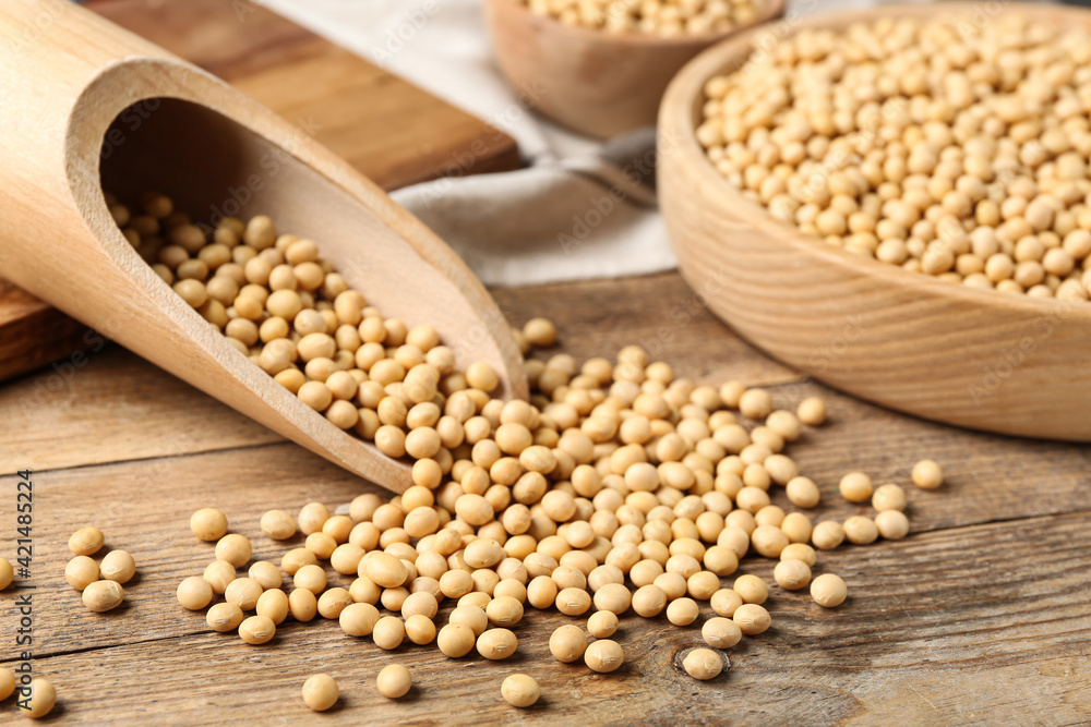 Fototapeta premium Natural organic soy beans on wooden table