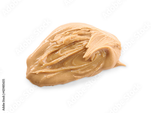 Delicious peanut butter isolated on white  top view