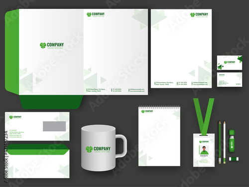 Corporate Identity Kit As Folder A4, Letterhead, Identity Card, Envelope, Pen Drive, Mug, Eraser And Pencil On Dark Grey Background.