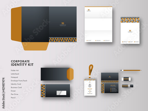 Corporate Identity Kit As Folder A4, Letterhead, Identity Card, Envelope, Pen Drive And Other Stationery Items On Grey Background.