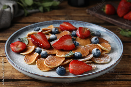 Wallpaper Mural Cereal pancakes with berries on wooden table Torontodigital.ca