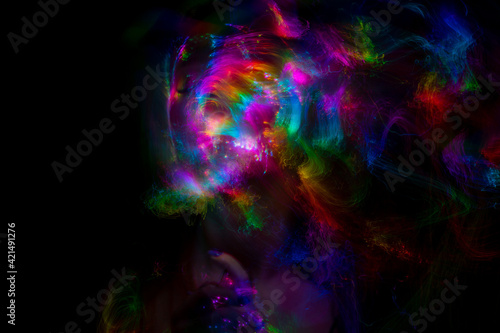 Multicolor abstract portrait of young woman on subject of creativity  imagination and art.