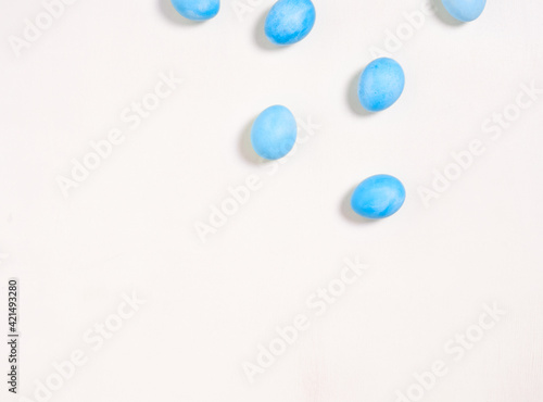 Easter eggs on white background. Easter concept. Top view.