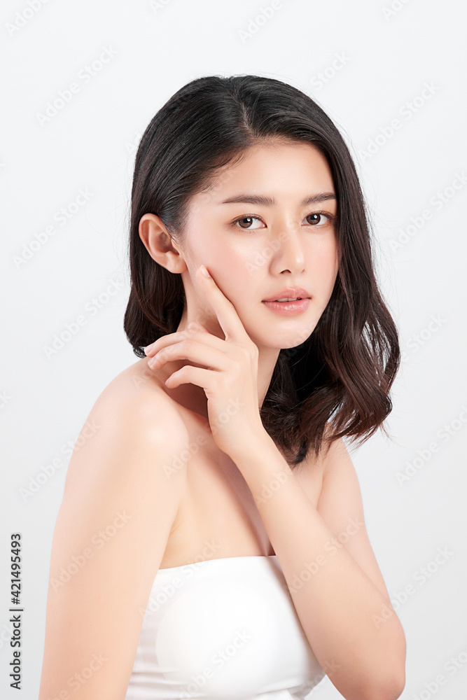 Beautiful young asian woman with clean fresh skin on white background, Face care, Facial treatment, Cosmetology, beauty and spa, Asian women portrait Beautiful young asian woman with clean fresh skin on white background, Face care, Facial treatment, Cosmetology, beauty and spa, Asian women portrait