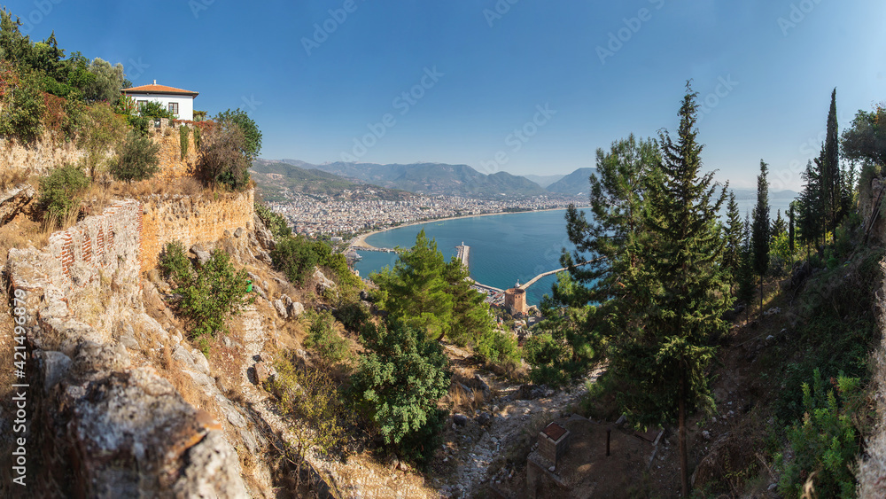 Panoramic views of the mountains, sea, Red Tower and Turkish resort of Alanya, Turkey