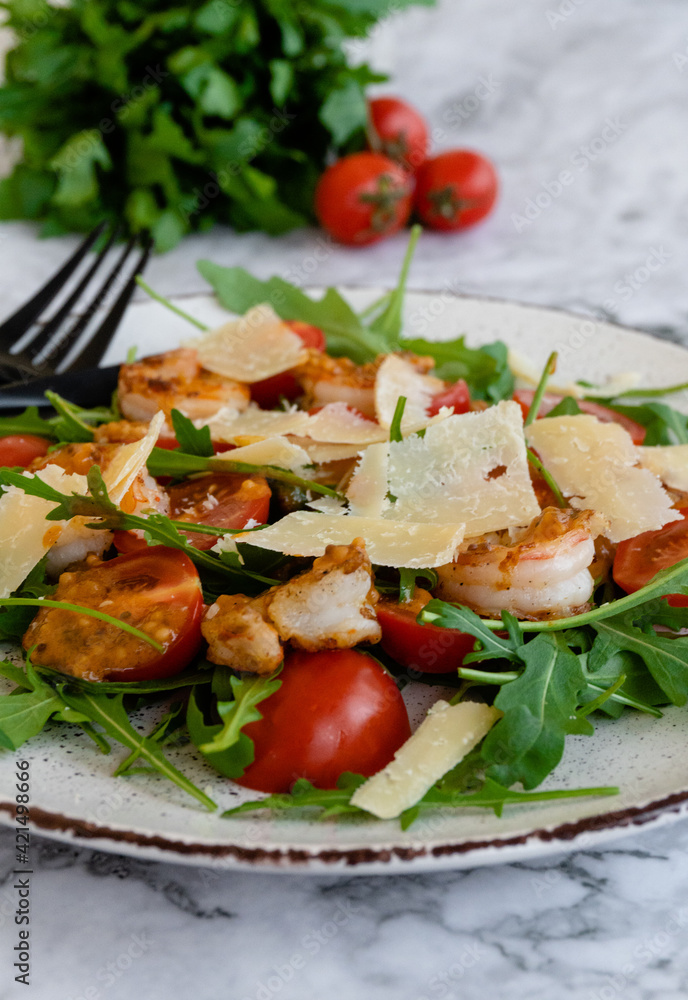 salad with arugula, shrimps and parmesan cheese salad with arugula, shrimps and parmesan cheese