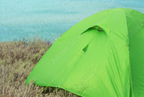 Tent on the sea coast Copy space © Victoriia