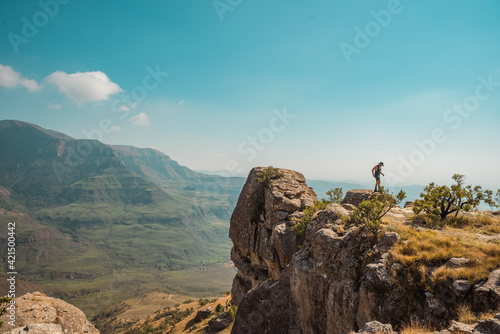 Person on mountaintop in the Drakensburg, South Africa. October 2019