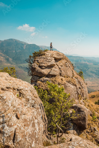 Person on mountaintop in the Drakensburg, South Africa. October 2019