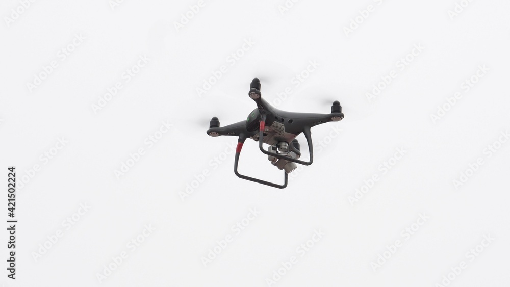 Drone flying aganst white background
