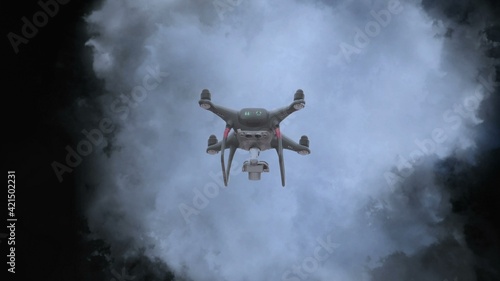 Drone flying aganst stormy clouds photo