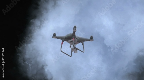 Drone flying aganst stormy clouds photo