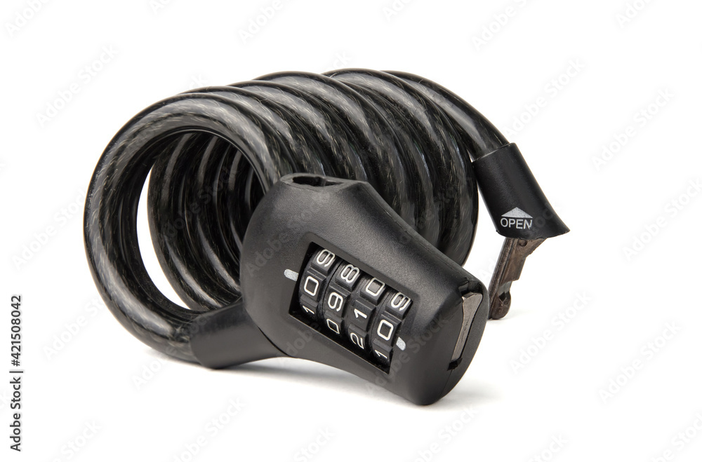 New cable coiled black combination bicycle lock isolated on white background New cable coiled black combination bicycle lock isolated on white background