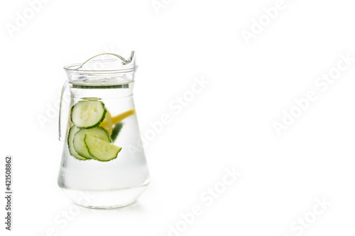 Sassy water or water with cucumber and lemon in jar isolated on white background.Copy space