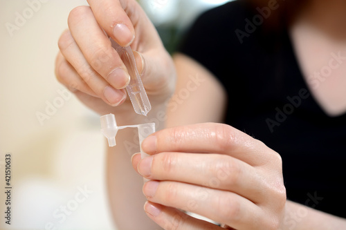 Woman preparing self test or quick test for Corona or Covid-19