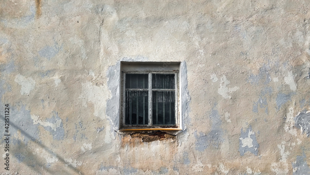 old window in the old wall