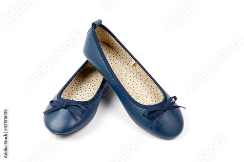 Women's light blue low-heeled shoes, shot against a white background.