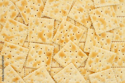 Saltine crackers in pile background photo