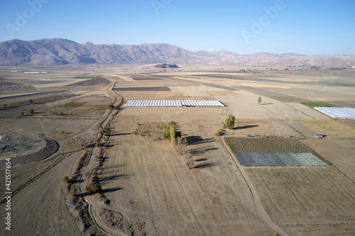 Mountain valley with farmlands in Turkey. Aerial panoramic view.