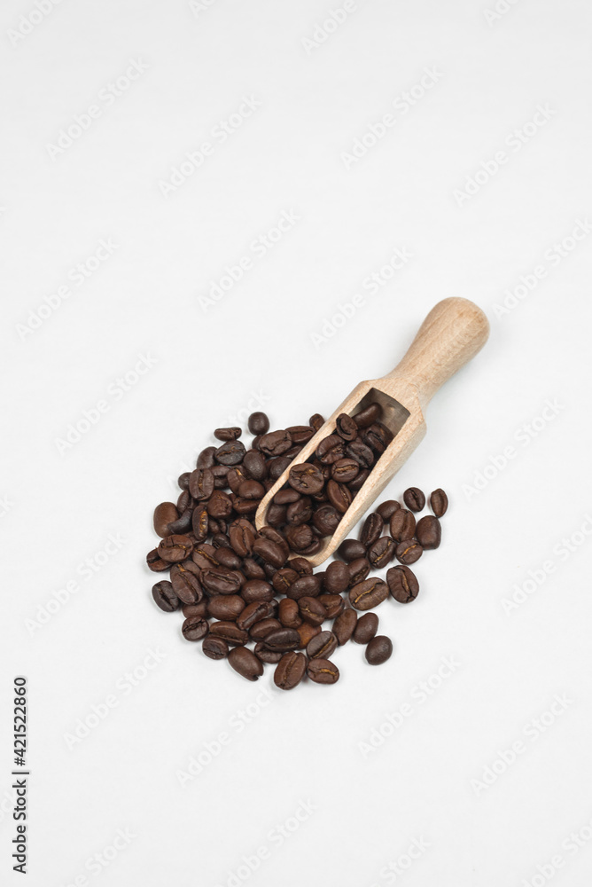 a handful of coffee on a white background. healthy food. vegetarianism a handful of coffee on a white background. healthy food. vegetarianism