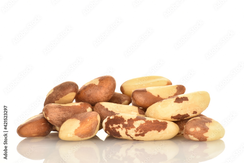 Several ripe organic Brazil nuts, close-up, isolated on white. Several ripe organic Brazil nuts, close-up, isolated on white.