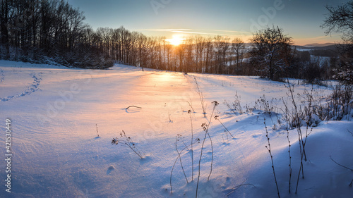 Shadows on the fresh snow in the winter sunset at Lower Silesia, Poland