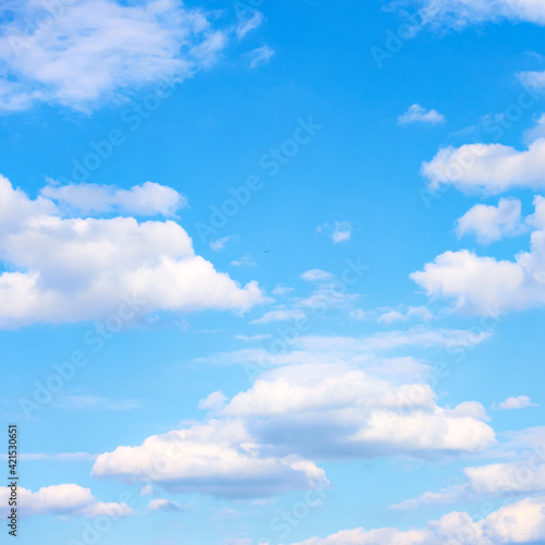 Blue sky with white heap clouds