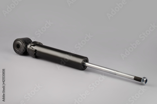 Wallpaper Mural Trucks Cabin Shock Absorber, New auto parts, spare parts Cabinedemper. Shock absorber on a gray background. Torontodigital.ca