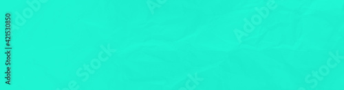 Pastel green crumpled paper texture background