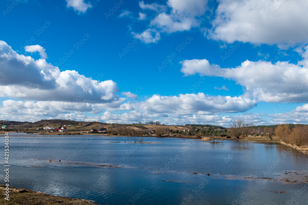 Spring floods on the river floodplain. Made on a sunny day, harsh sun, early afternoon Spring floods on the river floodplain. Made on a sunny day, harsh sun, early afternoon