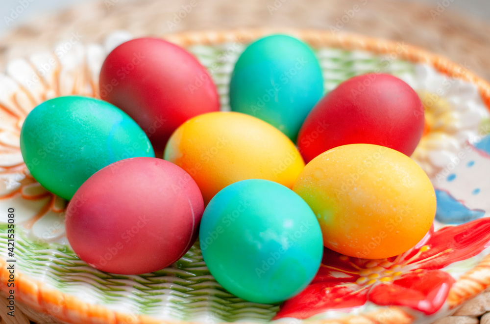 Colorful easter eggs on a plate Colorful easter eggs on a plate