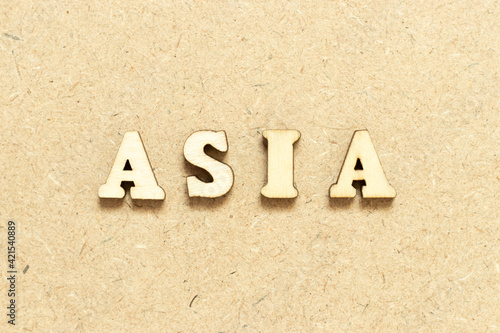 Alphabet letter in word asia on wood background