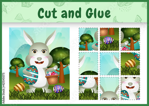 Children board game cut and glue themed easter with a cute rabbit holding the bucket egg and easter egg