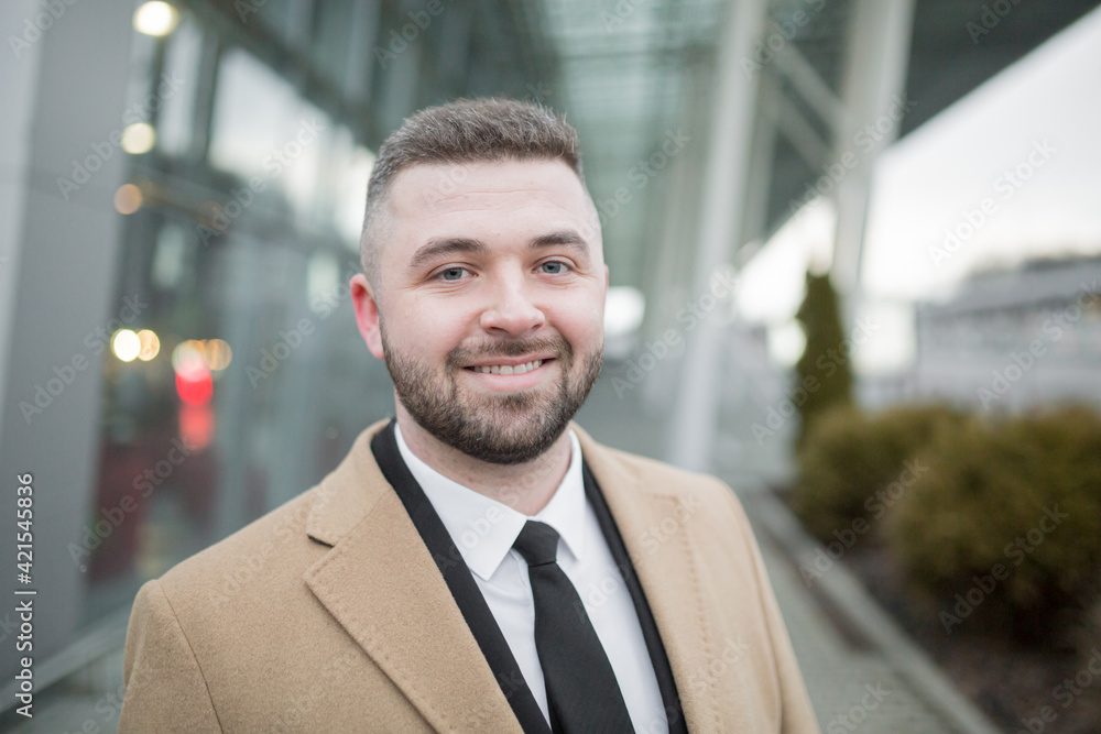 Close up photo, businessman uses phone, portrait of a nice man with beard Close up photo, businessman uses phone, portrait of a nice man with beard