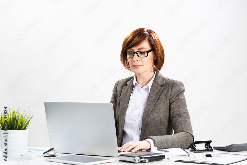 Attractive middle aged businesswoman working Attractive middle aged businesswoman working