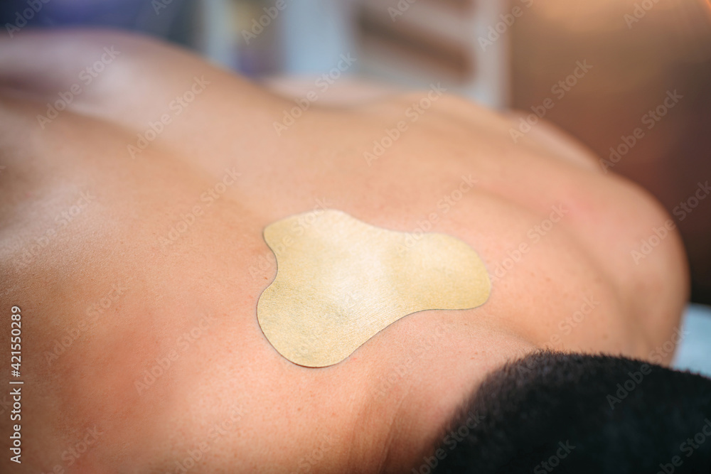 Fototapeta premium Herbal Pain Relief Plaster, Calming Trapezius Muscle Pain.