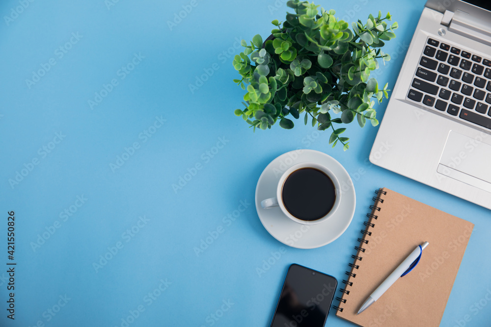 Office desk table with laptop computer, coffee cup Office desk table with laptop computer, coffee cup