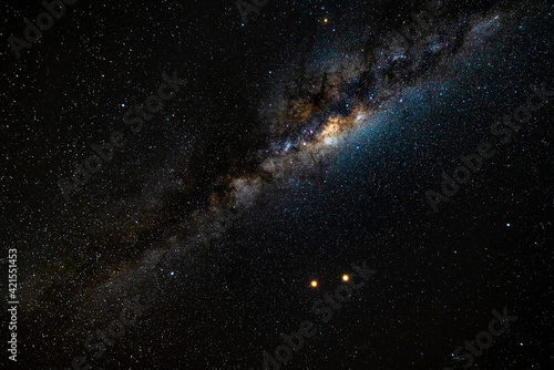 The Milky way during the total lunar eclipse of 27 July 2018. The big reddish spot is the Moon with Mars also shining brightly to it's right, photographed by Kokerboomkloof in the Ai-Ai Richtersveld T