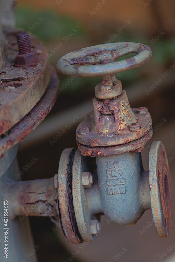 rusty old valve of a ventilation system in Landschaftspark Duisburg rusty old valve of a ventilation system in Landschaftspark Duisburg