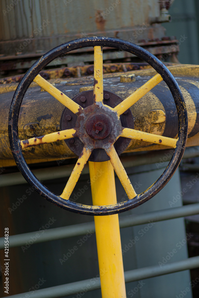rusty old valve control wheel in Landschaftspark Duisburg
