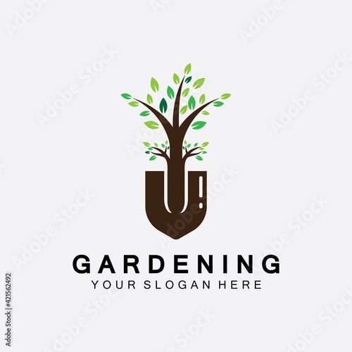 Gardening logo with shovel icon and tree with green leaves logo template.