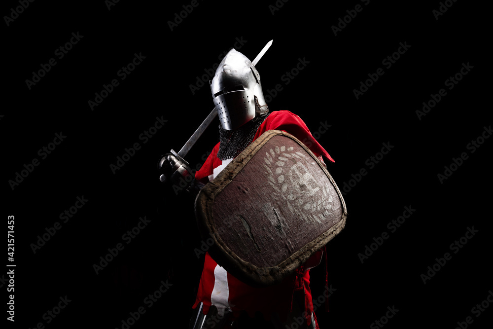 Naklejka premium Knight with sword and red checkered shield.