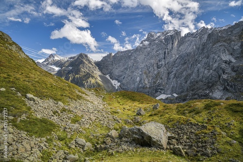 Autumn hike during sunny day in Swiss Alps photo