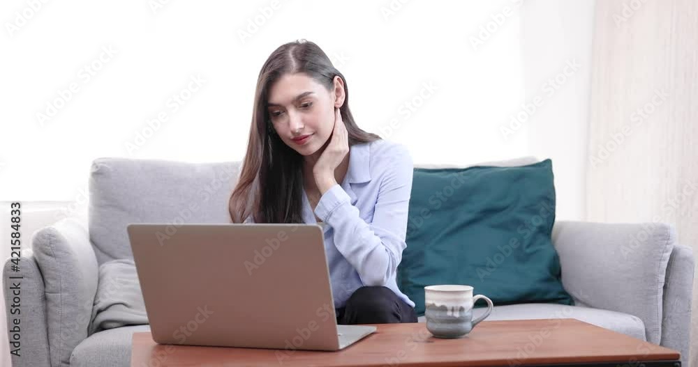 Beautiful young woman working on laptop computer, Work from home. Beautiful young woman working on laptop computer, Work from home.