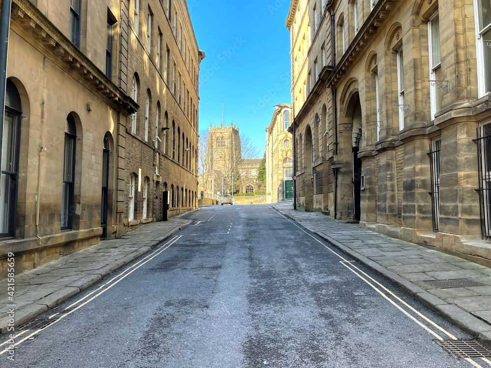 View along, Vicar Lane, with Victorian warehouses, built with stone in, Little Germany, Bradford, UK