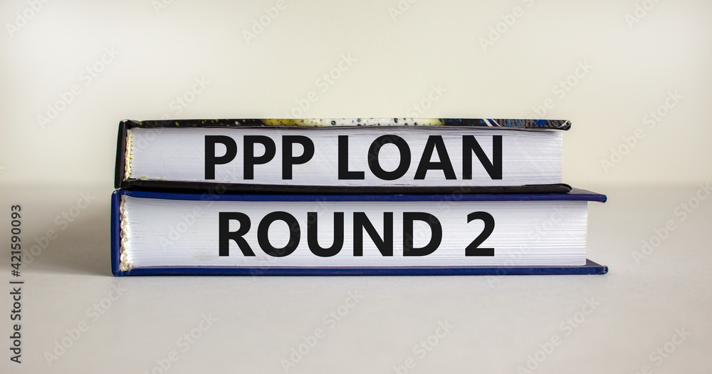 PPP, paycheck protection program loan round 2 symbol. Concept words PPP, paycheck protection program loan round 2 on books on a white background. Business, PPP loan round 2 concept.